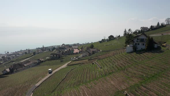 Aerial of small farming town in beautiful green countryside