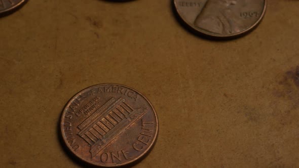 Rotating stock footage shot of American pennies (coin - $0.01) - MONEY 0171