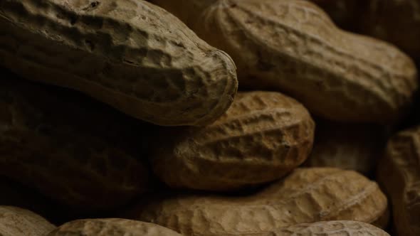 Cinematic, rotating shot of peanuts on a white surface - PEANUTS 025