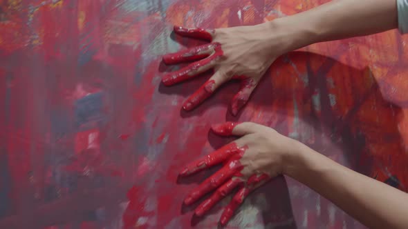 Using Hands Creates Colorful, Contemporary Painter Creating Abstract Modern Art