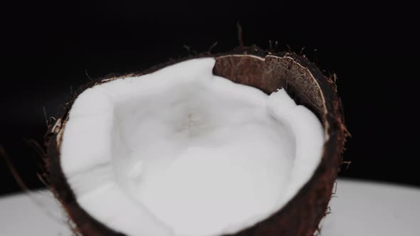 The Rotation of Halves of Coconut Close Up