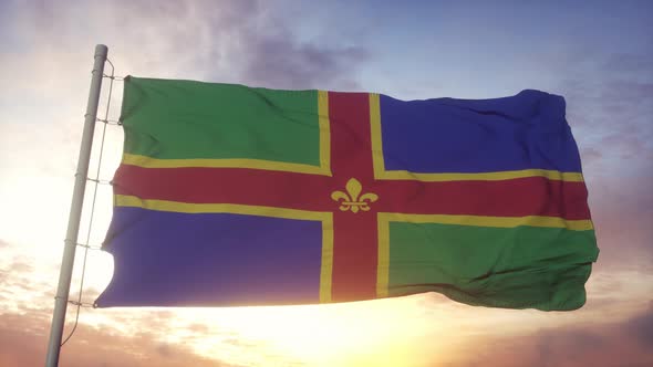 Lincolnshire Flag England Waving in the Wind Sky and Sun Background