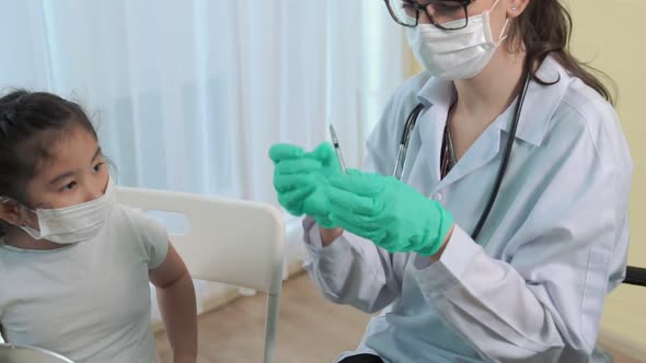 School Girl Visits Skillful Doctor at Hospital for Vaccination