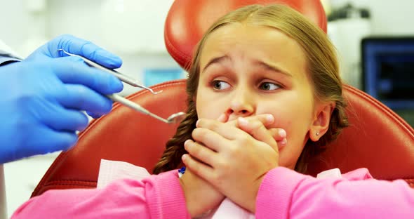 Young patient scared during a dental check-up