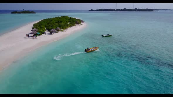 Aerial drone shot sky of perfect coast beach lifestyle by clear water with white sand background of 