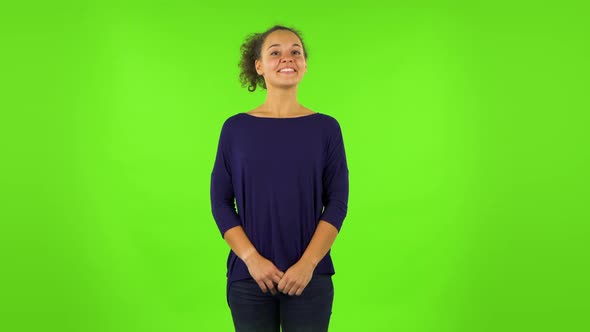 Curly Woman in Anticipation of Worries, Then Disappointed. Green Screen