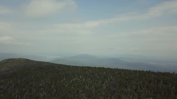 Aerial footage of White Cap Mountain situated within the watershed of the Pleasant River located in