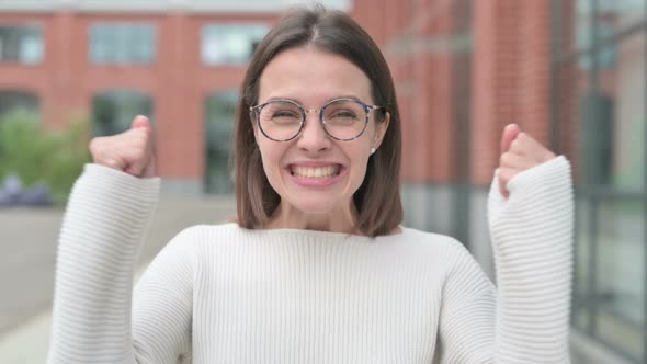 Excited Woman Celebrating Success, Outdoor