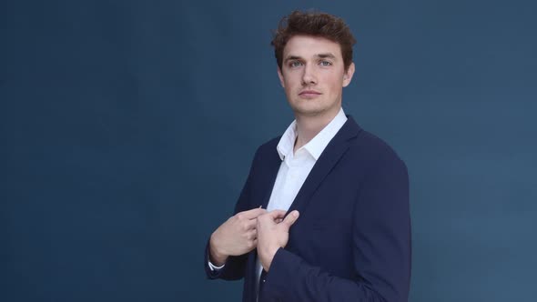 Attractive Male Model in a Blue Blazer Business Attire