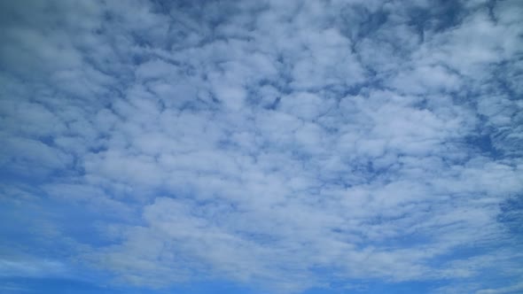 Fluffy cloud time lapse on a cloudy day 4k footage.