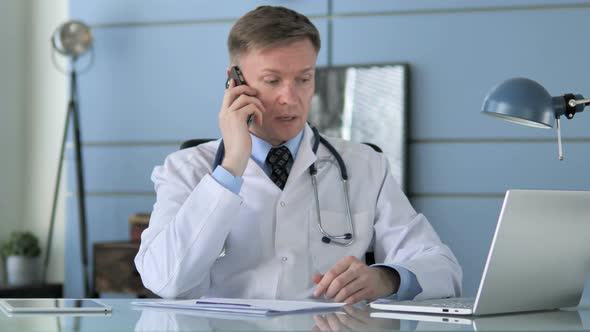 Doctor Talking on Phone