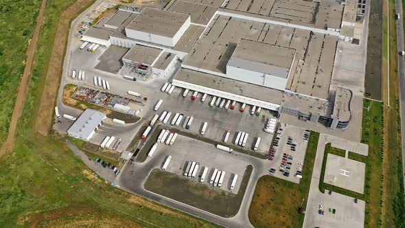 large industrial center with parking for trucks.