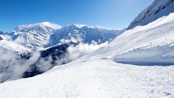 Motions Image of Skier Going Down on the Alpine Slope Track