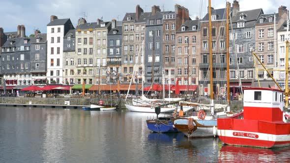 Honfleur waterfront and port with the picturesque buildings displaying their patterns, France