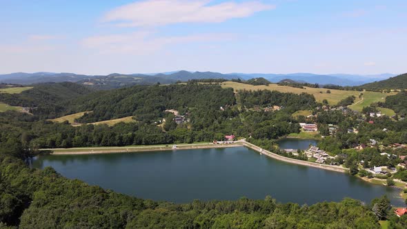 Aerial view of Vindsachtske lake in the village of Stiavnicke Bane in Slovakia