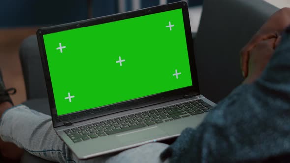 Close Up of Mock Up Green Screen Laptop Display