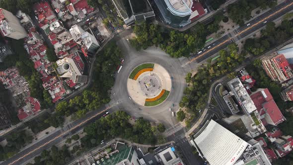Roundabout of angel of independence on aerial footage on cenit during cars cross the avenue in the m