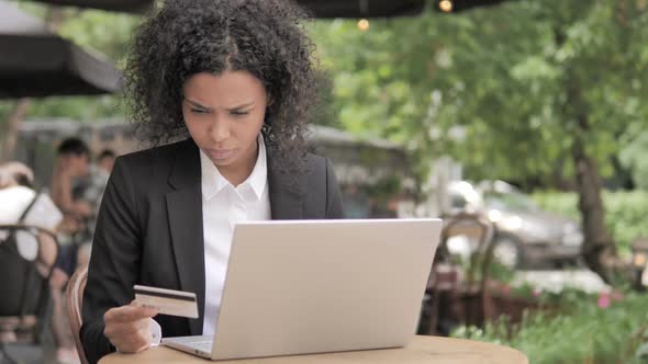 Online Shopping Failure for Young Woman Sitting on Bench