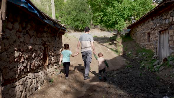 Father Takes His Children Around The Resort