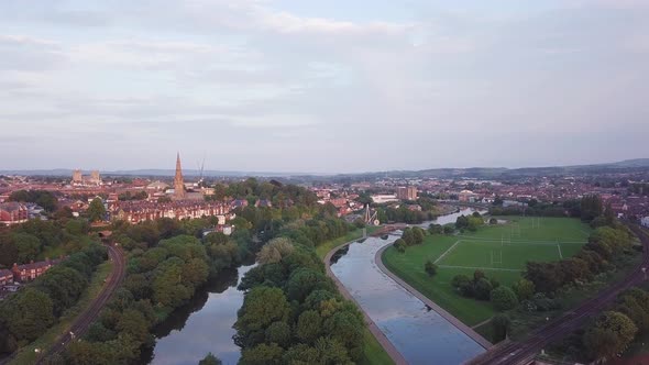 An aerial shot of the rivers running through Exeter at sunset