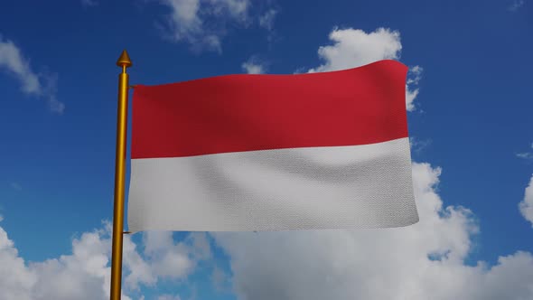 National flag of Monaco waving with flagpole and blue sky timelapse