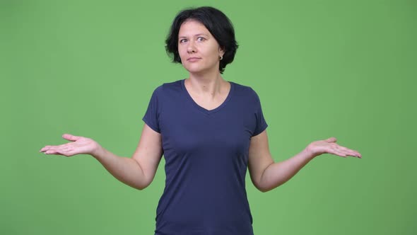 Beautiful Woman with Short Hair Shrugging