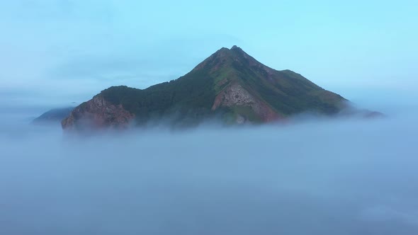 Flying Through a Morning Fog in Tikhaya Bay, Sea of Okhotsk, Sakhalin Island, Russia