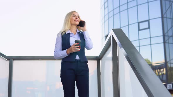 Portrait of Happy 50 Yearsbusiness Woman Calling Phone Outdoor