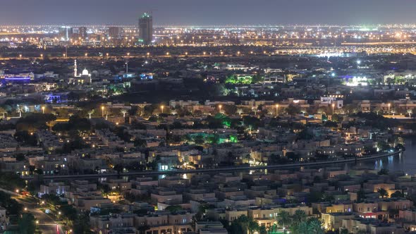 Aerial View to Villas and Houses with Golf Course Night Timelapse