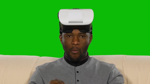 Man in the Mask of Virtual Reality. Green Screen