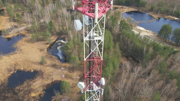 Telecommunication Tower with Satellite Dish Antennas Aerial Drone View