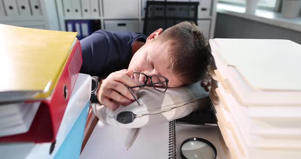 Workaholic Businessman Tired Sleeps at Workplace Closeup