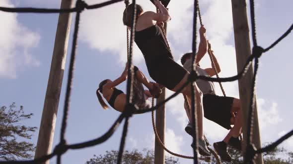 Young adults training at an outdoor gym bootcamp