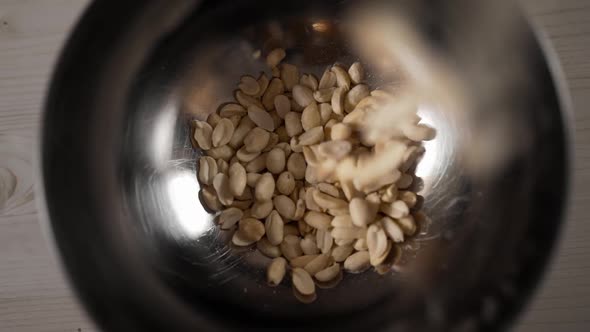 Roasted Peanut Falls in Slow Motion To the Iron Bowl, Snacks for Beer, Salted Nuts, Fast Food, 60Fps