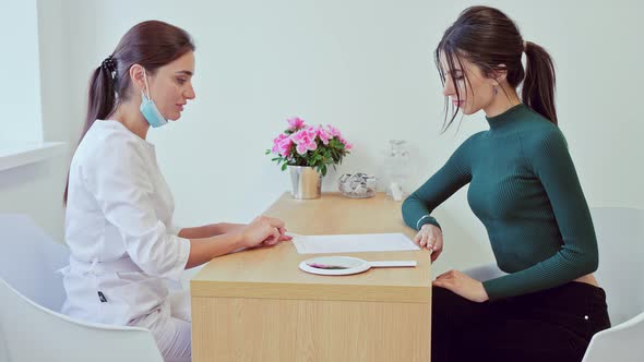 Young Woman Visits Cosmetologist Doctor