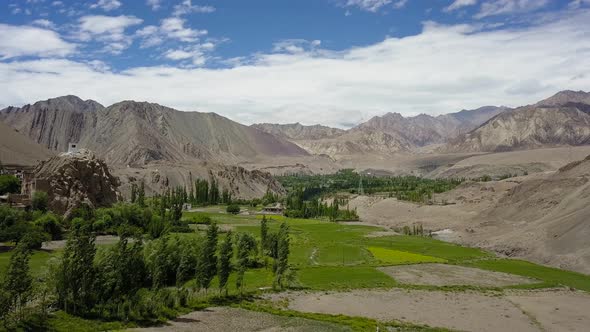 Wide Establishing Aerial of Ladakh Indian Himalayan landscape and village