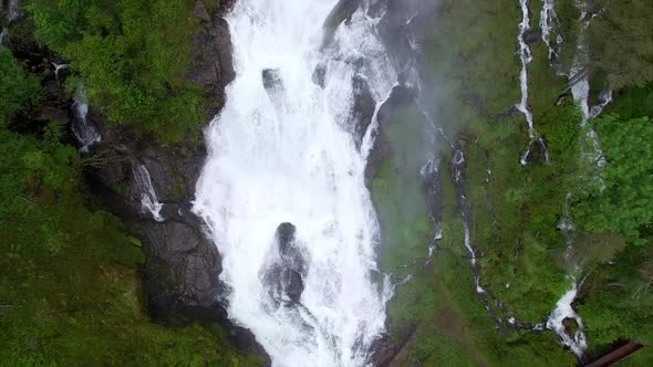 Flying over huge waterfall in Norway, Ryfylke, aerial footage