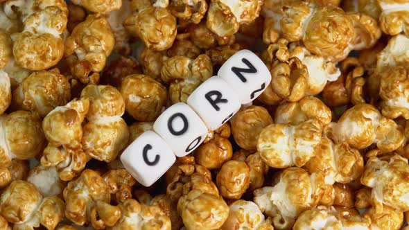 Coffee taste popcorn rotating close up. Caramel popcorn. Healthy food for morning breakfast