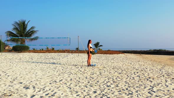 Modern smiling girls on holiday in the sun at the beach on paradise white sand and blue background 4