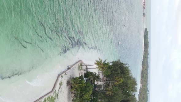 Vertical Video of the Ocean Near the Coast of Zanzibar Tanzania Aerial View