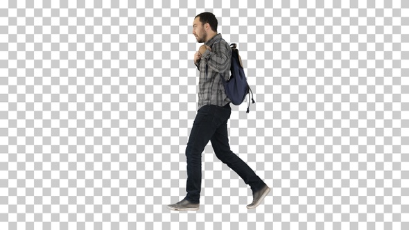 Young male student walking on isolated, Alpha Channel