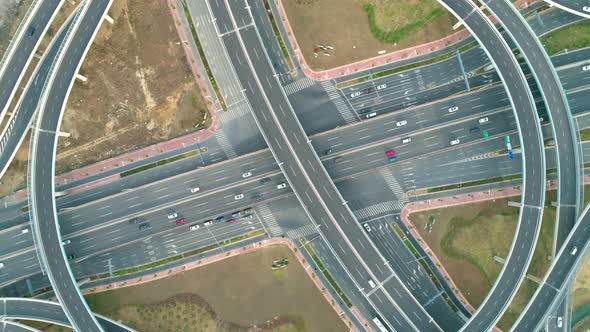 Top View to the Cars Driving on Multilevel Highway on the Sunset