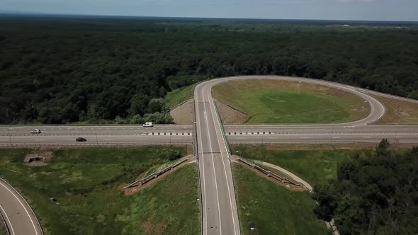 Aerial View of Highway Road Junction in the Countryside with Trees