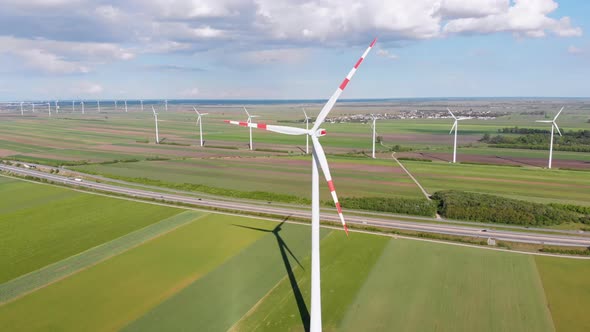 Aerial View of Wind Turbines Farm in Field. Austria. Drone View on Energy Production