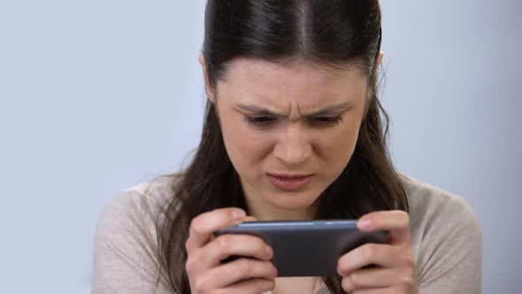 Gadget Addicted Woman Playing Video Game on Smartphone, Modern Technology