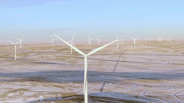 Aerial shots of wind turbines on a cold winter afternoon in Calhan, Colorado