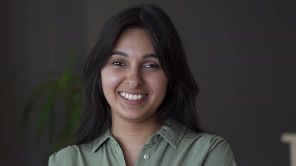 Smiling Young Indian Woman Looking at Camera at Home Office Headshot