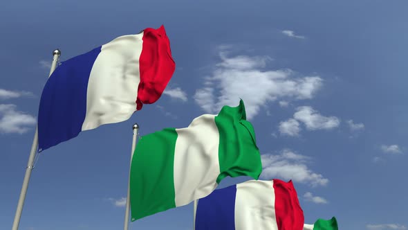 Flags of Nigeria and France Against Blue Sky alt