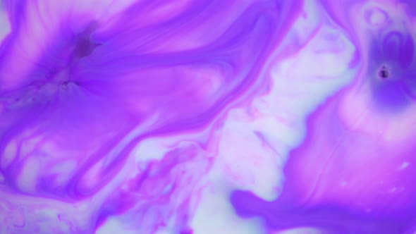 Ink in Water, Purple Ink Reacting in Water Creating Abstract Background alt