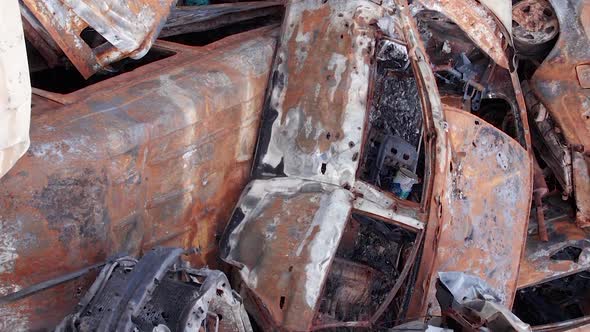 Vertical Video Irpin Bucha District  Destroyed Cars During the War in Ukraine